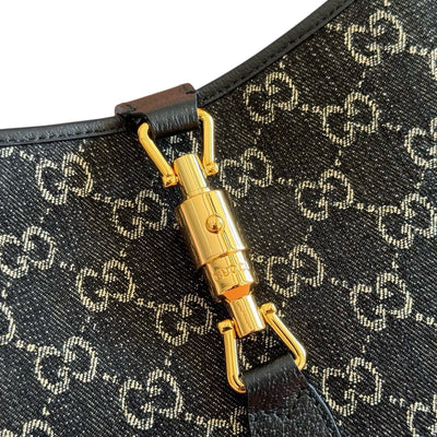 Noir Signature Shoulder Bag